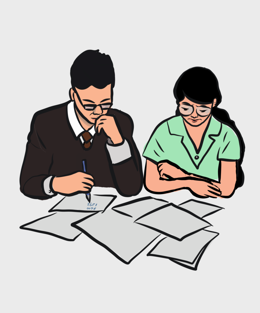 Casal analisando contas e organizando dívidas para limpar o nome e recuperar a saúde financeira.